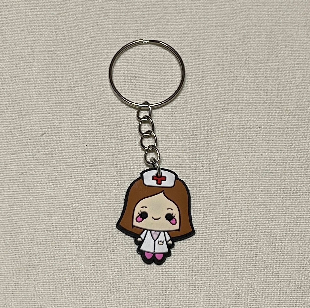 WhatsApp Image 2025-12-14 at 00.14.15 (3) Porte-clé silicone – Image 1